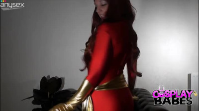 Hot babe puts on the Dark Phoenix costume and stuffs her twat with her dildo