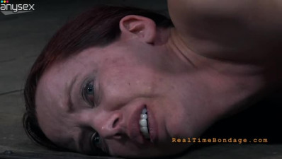 Nasty redhead with massive hooters gets her pussy toyed in the dungeon