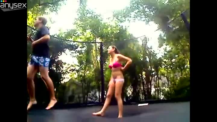 Neat hoe with perky tits is having an unforgettable sex on the trampoline Free Porn Videos | ePornAny.