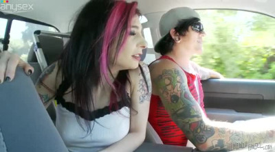 While driving in the car kinky black head Joanna Angel flash her titties