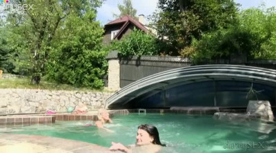 Summertime lesbian pleasures of two young babes by the pool