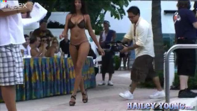 Sexy chick Hailey Yong taking part in hot bikini show