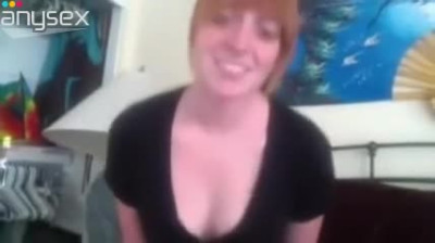 Kinky amateur redhead undresses to brag of booty and tickle pussy