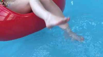 Japanese teen Yuwa Tokona testing new vibrating sex toy by the pool side