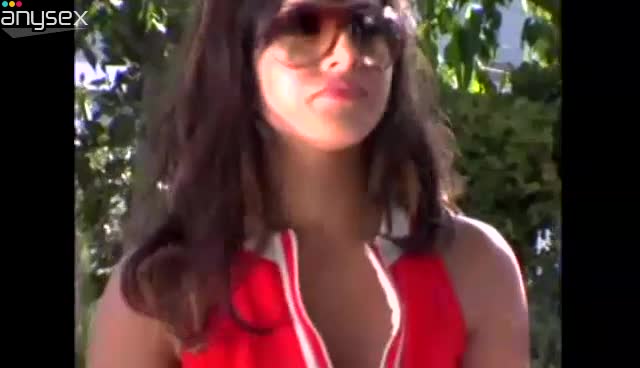 Awesome brunette in sunglasses Sunny Leone strips and poses nude outdoors Free Porn Videos | ePornAny.