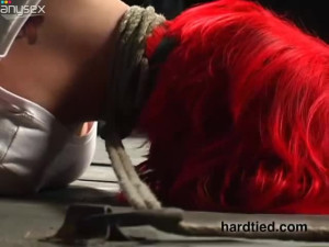 Slut with neon red hair Cherry is tied up before pussy punishment