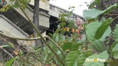 Light haired bitchy girlie pisses under the bridge