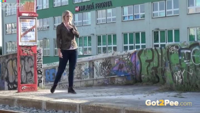 Shy light haired filth pissed on bus stop while waiting for her bus