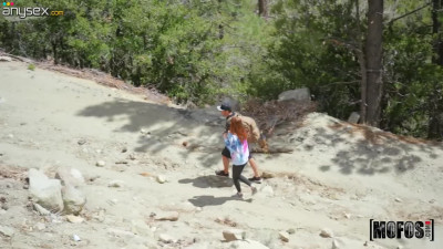 Young hiking couple has sex in the mountains in broad daylight