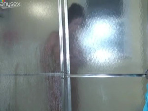 Beautiful girl with huge natural tits takes a shower