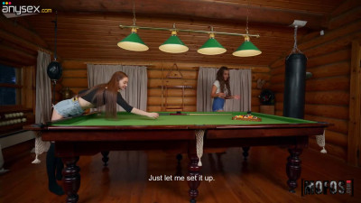 Two pretty girls fuck each other right on the billiard table