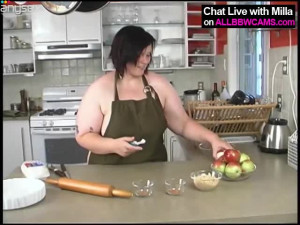 Fat BBW cook bakes apple pie in the kitchen half naked