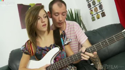Young brunette is making love with her guitar teacher