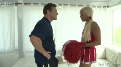 Sexy blonde cheerleader gives hot blowjob to the football coach