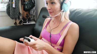 Teen Eliza Jane is playing video games while BF finger fucks her pussy