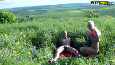 Beautiful Russian honey rides her boy's big long dick in the field