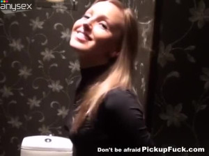 Slim blonde gives head in the restroom