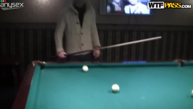 Toples girl with  small tits is playing billiard