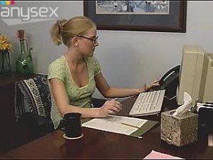 Adorable young office assistant masturbating at the desk