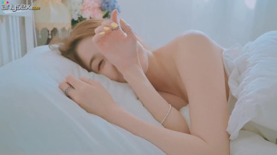 Good morning with young and beautiful Korean woman basking in bed