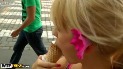 Blond cutie eats ice cream with her sweet mouth