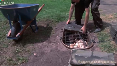 Maggie Mead is in the cage hole filled with mud till top