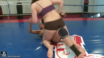 Spunked fighter Tiffany Doll goes against brunette and has a severe catfight