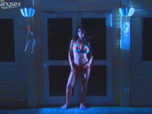 Serious chick Harumi Nemoto poses in bikini in the dark street