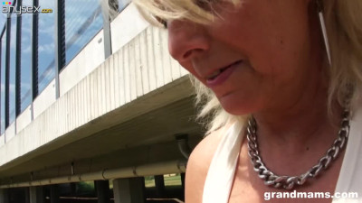 Slutty granny gives a blowjob in public and shows wet white panties