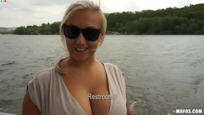 Curvy and busty blonde bombshell Cherlyn shows her giant tits on a boat ride