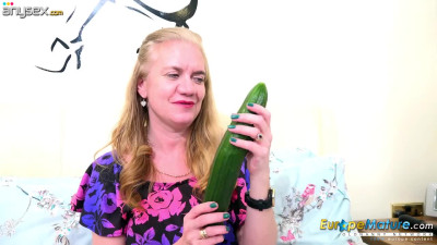 Sex-starved old woman Lily May tries to satisfy herself with a huge cucumber