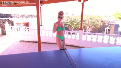 Three best girlfriend are playing table tennis without bikini tops