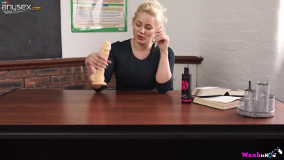 Sexy blond teacher Megan plays with suction cup dildo and gets naked