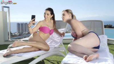 Two libidinous girlfriends are dildo fucking each others pussies by the poolside