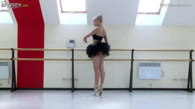 Slender ballerina Dora Tornaszkova gets naked and shows yummy pussy