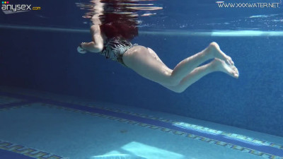 Gorgeous red haired mermaid Diana Rius shows underwater striptease