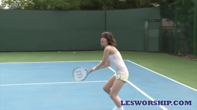 Two lesbians are eating each others pussies right on the tennis court