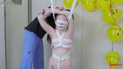 Two perverts analyse stretched butt hole of one tied up sexy chick