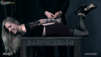 Tied up tramp Violet October gets punished in the dark basement