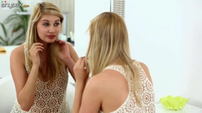 Beautiful creation Holly Anderson is masturbating her pretty pussy in front of the mirror