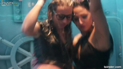 Captivating lesbians fuck each other under the shower in night club