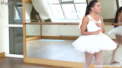 Petite ballerina Evelyn Dellai is playing with her sweet looking pussy