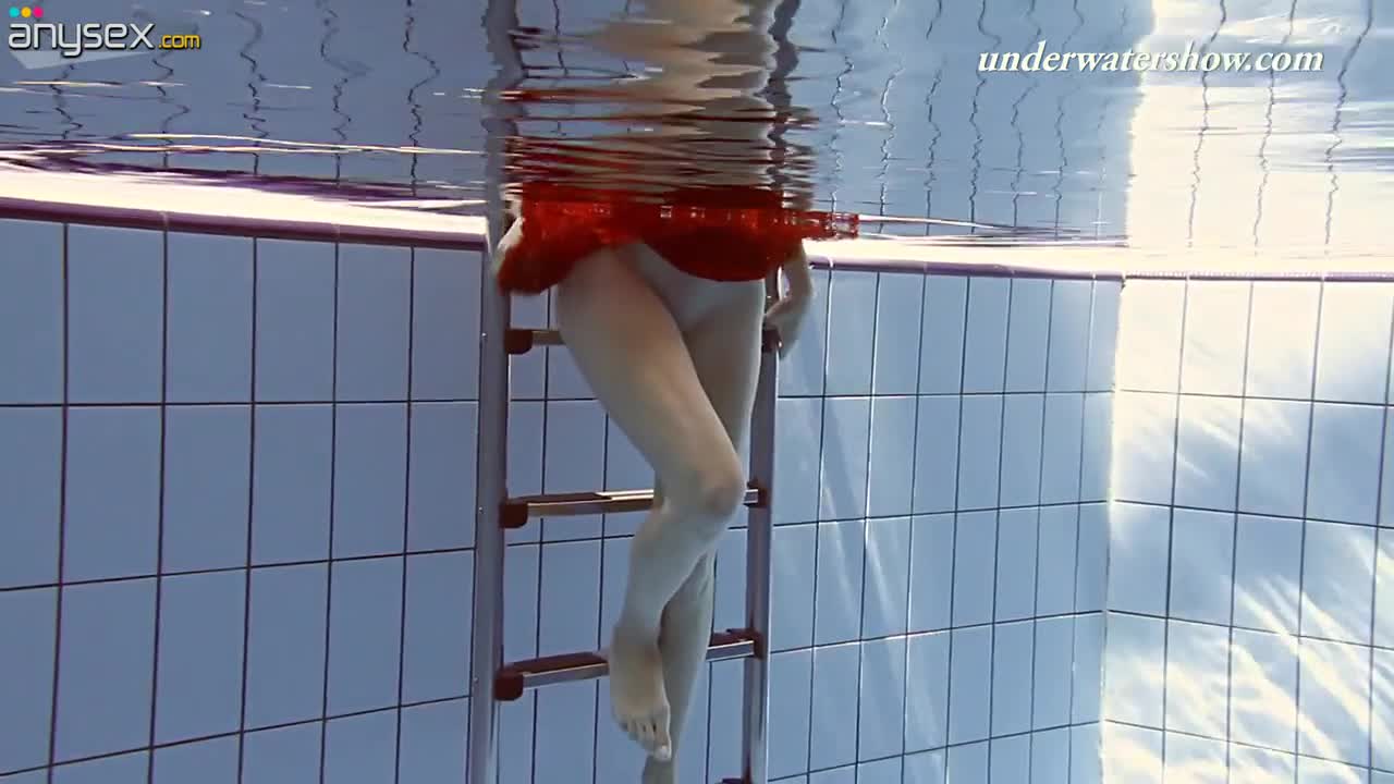 Sensual red haired babe Ala shows striptease under the water Free Porn Videos | ePornAny.