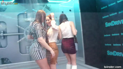 Three sex-appeal chicks are dancing under the shower in one night club