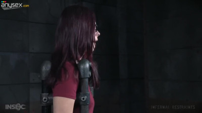 Red haired bitch Ivy Addams gets punished in the dungeon