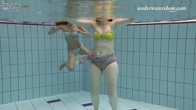 Horny chicks in bikinis Ala and Lenka play with each others pussies under the water