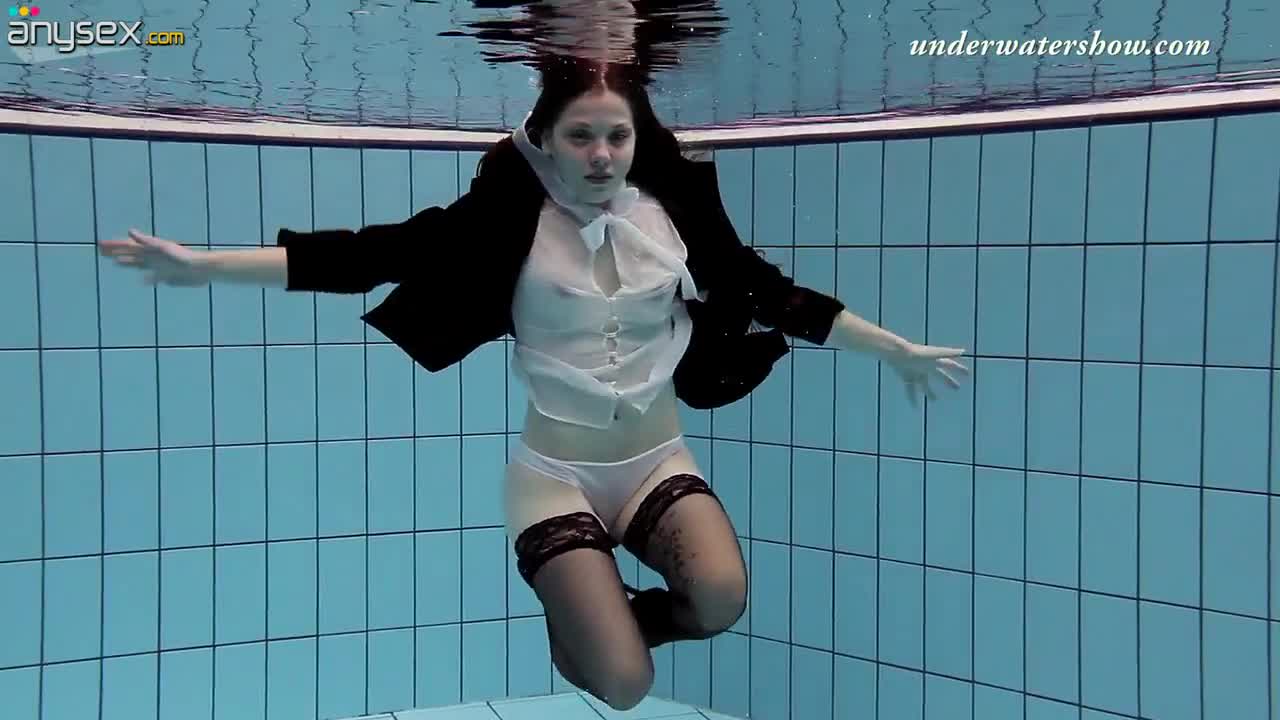 Yummy red haired babe Salaka Ribkina is stripping  under the water Free Porn Videos | ePornAny.