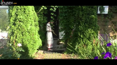 Russian beauty masturbates in the garden